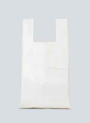 The new shopping bag oil | white The new shopping bag oil | white
